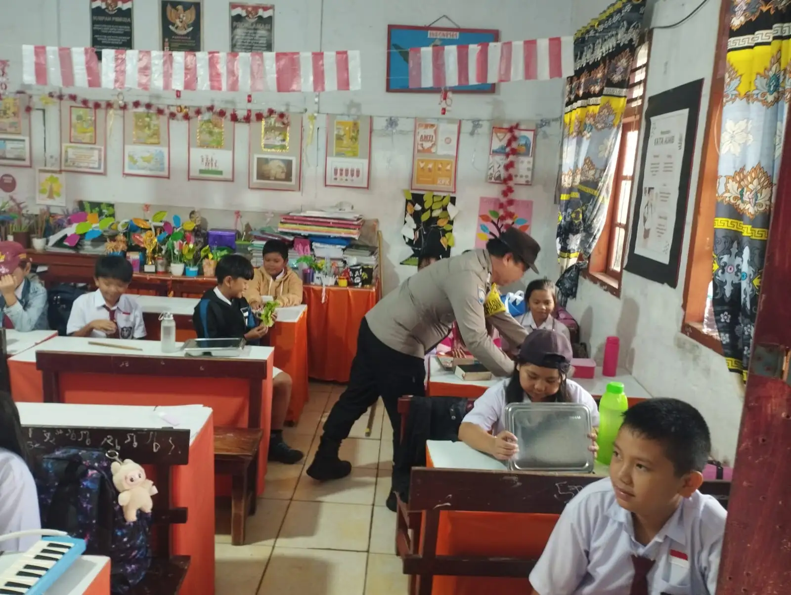 Penyaluran Makanan Sehat Bergizi untuk 1.164 Pelajar di Langowan Utara Berjalan Lancar